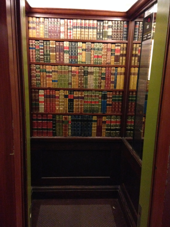 Faux library elevator at the Hotel Stanhope, Brussels