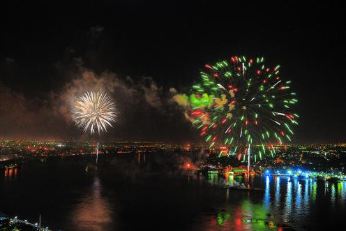 The 4th of July "Dueling Barges" on either side of the Mississippi in New Orleans