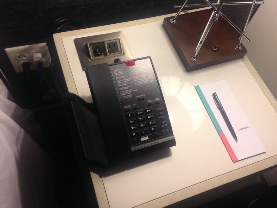 Notice the built-in chargers right in the nightstand!