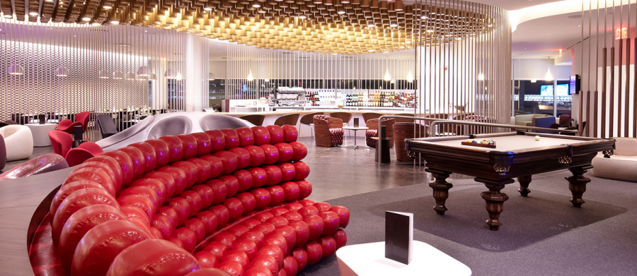 The swanky Virgin Atlantic Clubhouse at JFK gives you numerous amenities, including a pool table!