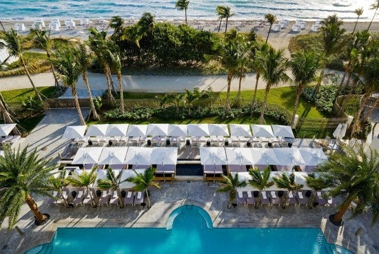 An aerial view of the St. Regis Bal Harbour's beach club and one of its infinity pools.