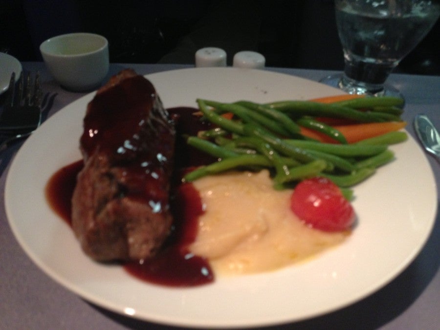 Tasty steak dinner in BusinessFirst