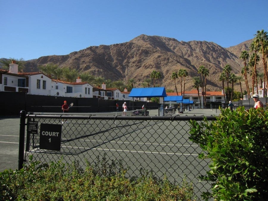Get your swing on with a tennis match while in the desert.