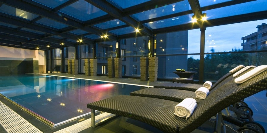 Relax at the indoor pool in the Radisson Blu Milan.