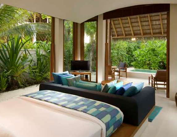 The bedroom was decorated in soothing blues and turquoises.