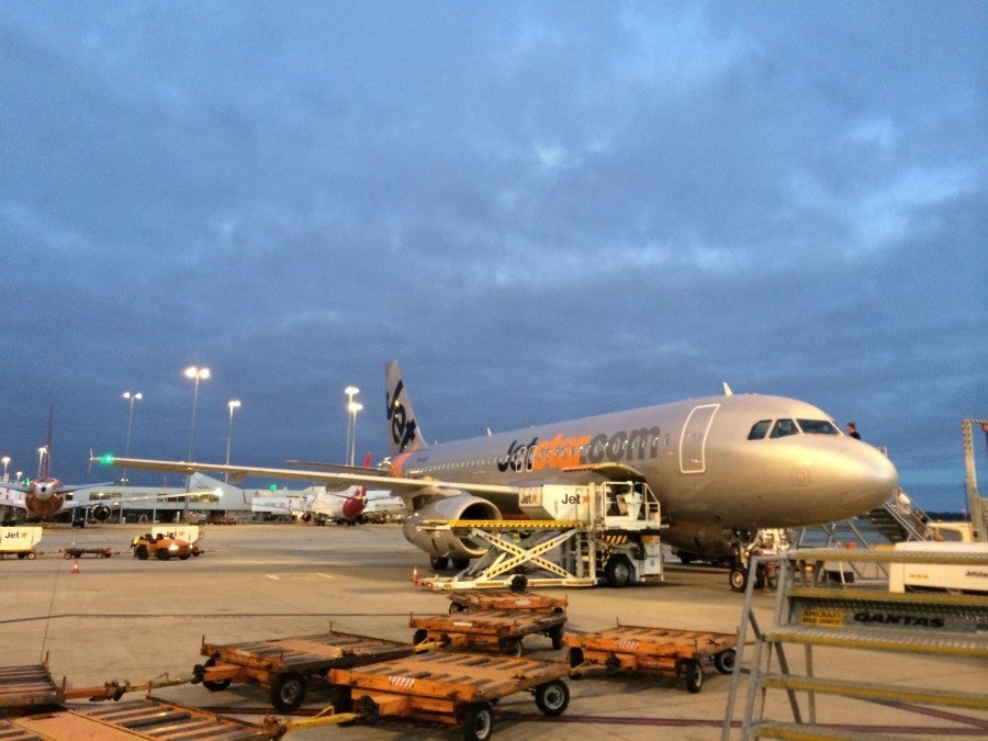 Al fresco boarding - our plane waits to take us to Hamilton Island.