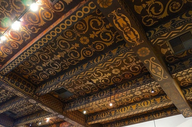 This section of the Wine Cask's hand-painted ceiling, which dates to 1924, survived the 1925 earthquake