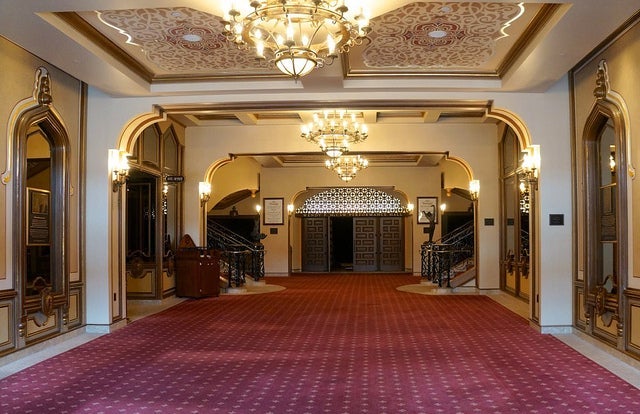 The lavish, gilded lobby of the Granada Theater