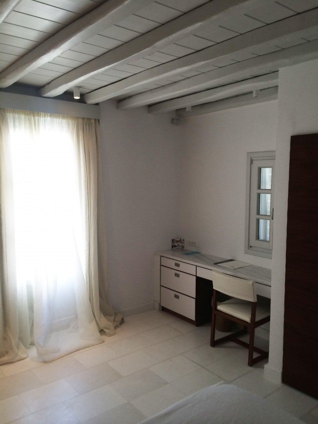 My room came with a desk (where I'd hoped to do more work than I did), marble floors and gauzy curtains