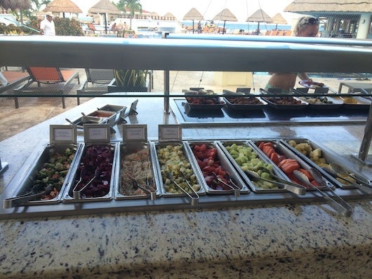 The poolside buffet of salads and fruit