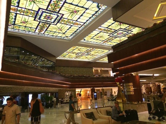 The Tiffany-style glass ceiling conjured a feeling of antiquity in the resort's lobby