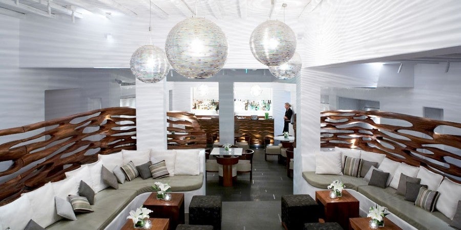The Hotel Belvedere Mykonos' subdued decor features natural material like carved rosewood (photo by Hotel Belvedere Mykonos)