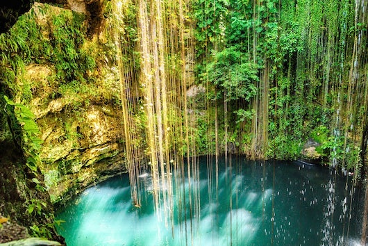 A cenote near Chichen Itza. Photo courtesy Shutterstock.