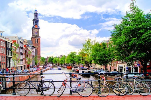 Canals and bicycles in Amsterdam. Photo courtesy Shutterstock.