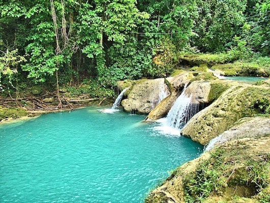 Blue holes and waterfalls in beautiful Jamaica. Photo courtesy of Shutterstock.