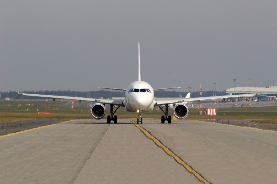 If your plane is delayed on the tarmac for more than 3 hours, you are entitled to get off. Image courtesy of Shutterstock.