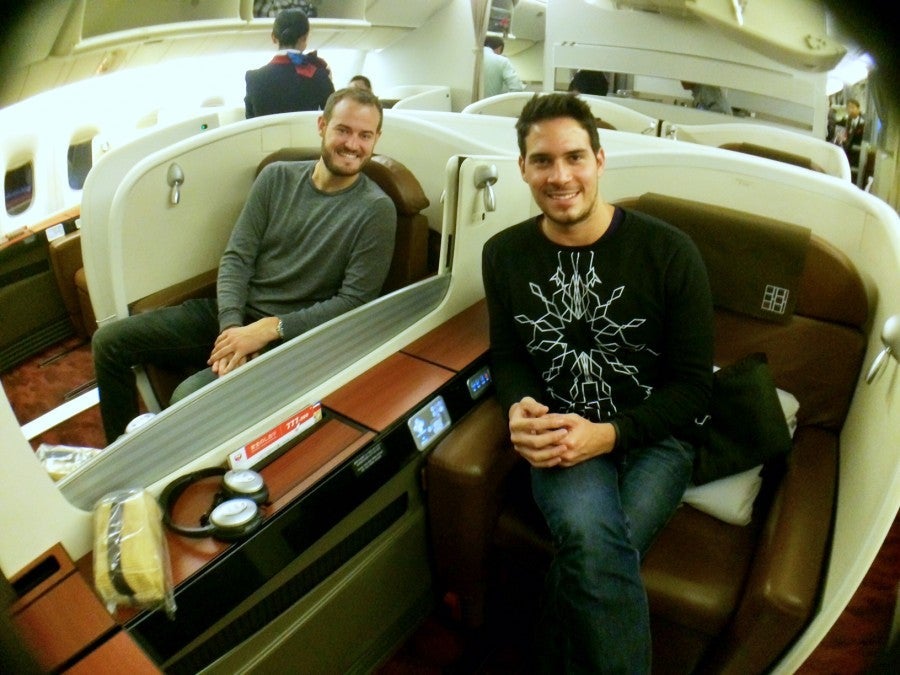 Me (left) and Julio onboard JAL's Bowing 700-300, in our adjoining first-class Sky Suites.