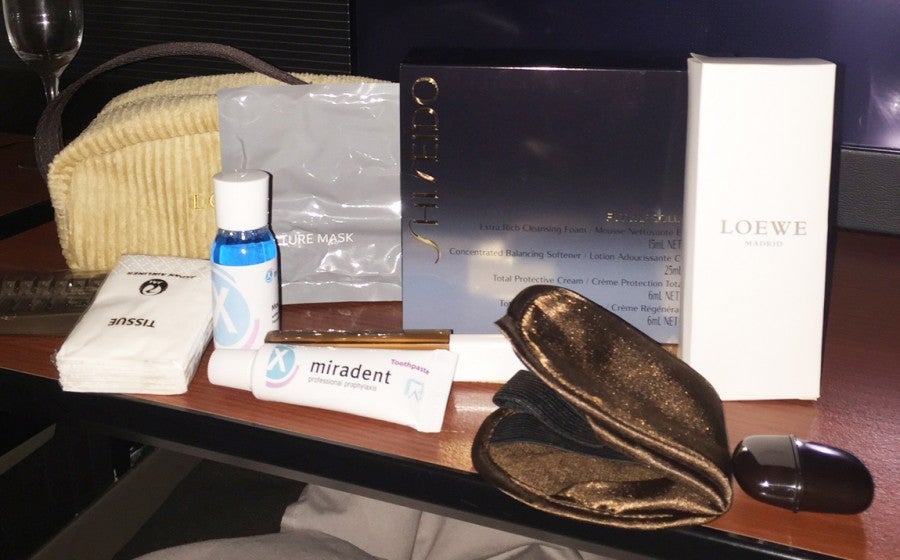 JAL's first-class amenity kit, packaged in a corduroy toiletry kit. includes products from Spanish company Loewe.