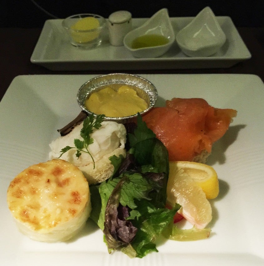 The main dish of my Western-style breakfast: poached eggs with Hollandaise, potato gratin