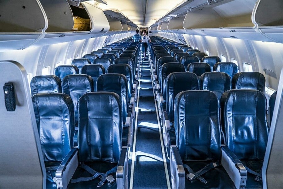 sun-country-charters-mia-sna-economy-cabin-