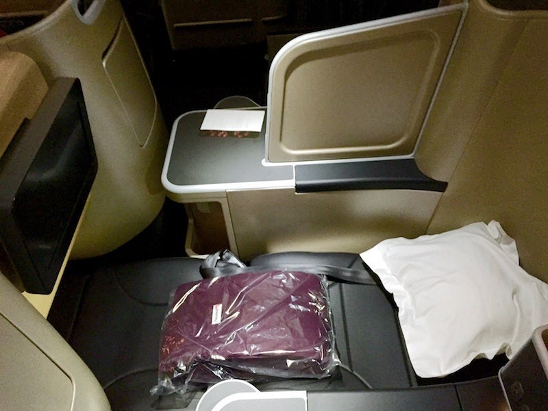 The seat in the fully reclined position. I had a lot of room myself.