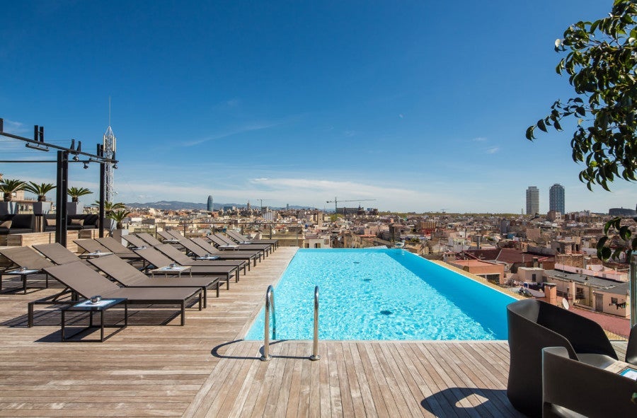 If you like rooftop pools with a city view, you're bound to love Barcelona's Grand Hotel Central. Photo courtesy of the hotel. 