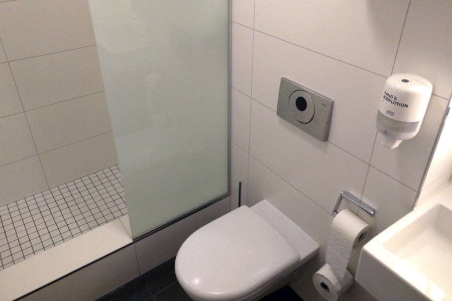 The shower looked like something you'd find in a hospital, not an international lounge.