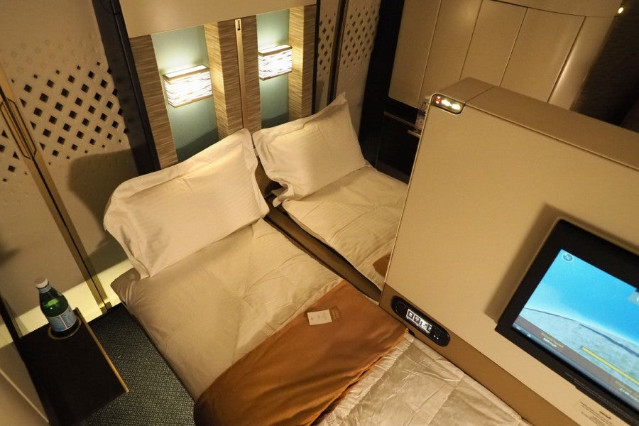 With the partition lowered, you can have an in-flight double bed.
