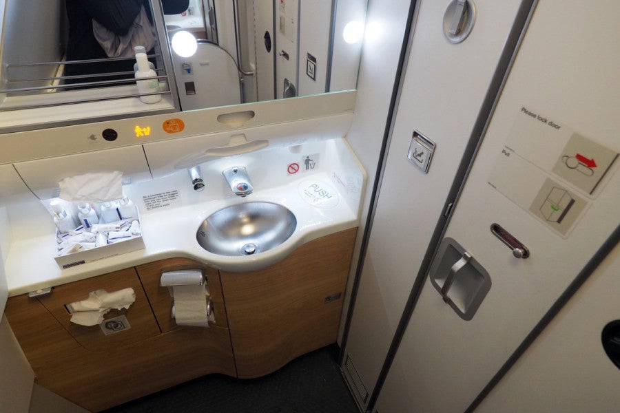 With only two lavatories for 45 business-class seats, there's often a wait.