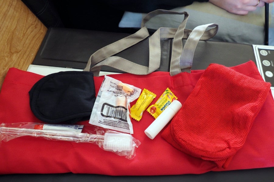 Swiss is currently offering a variety of amenity kits, including this colorful tote bag.