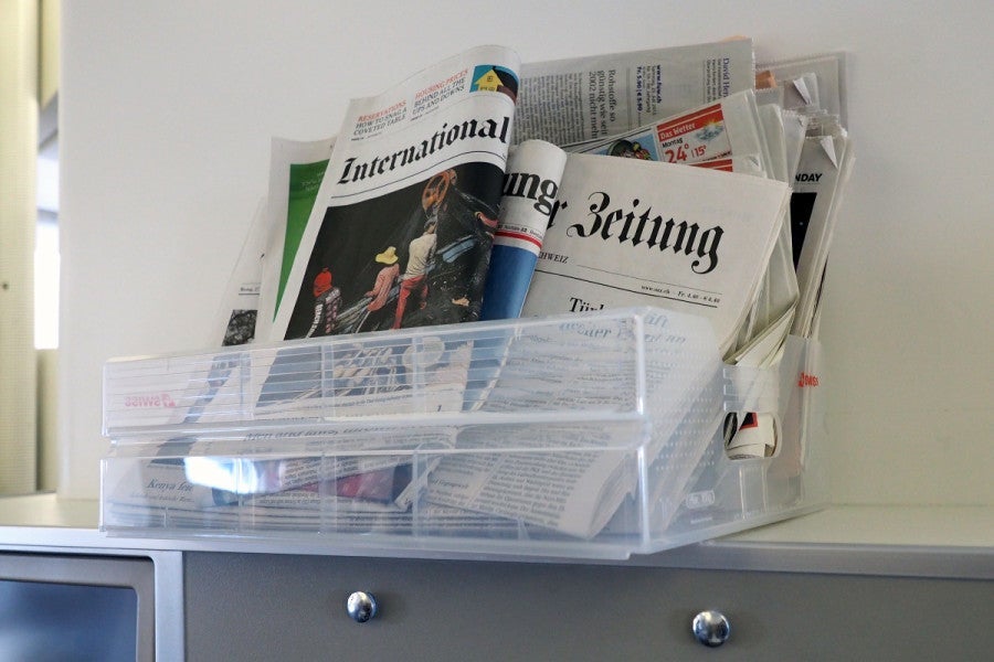 Newspapers were stored at our seat during boarding, prompting many visits from the crew.