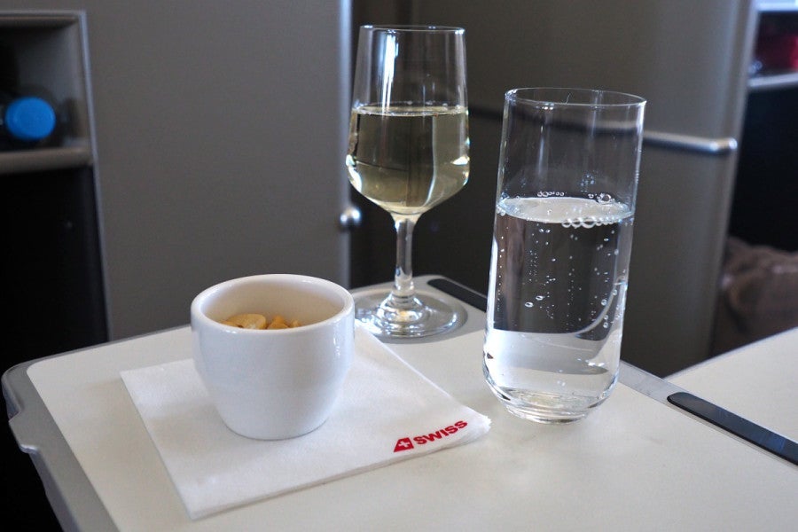 Champagne, nuts and water were served shortly after takeoff.