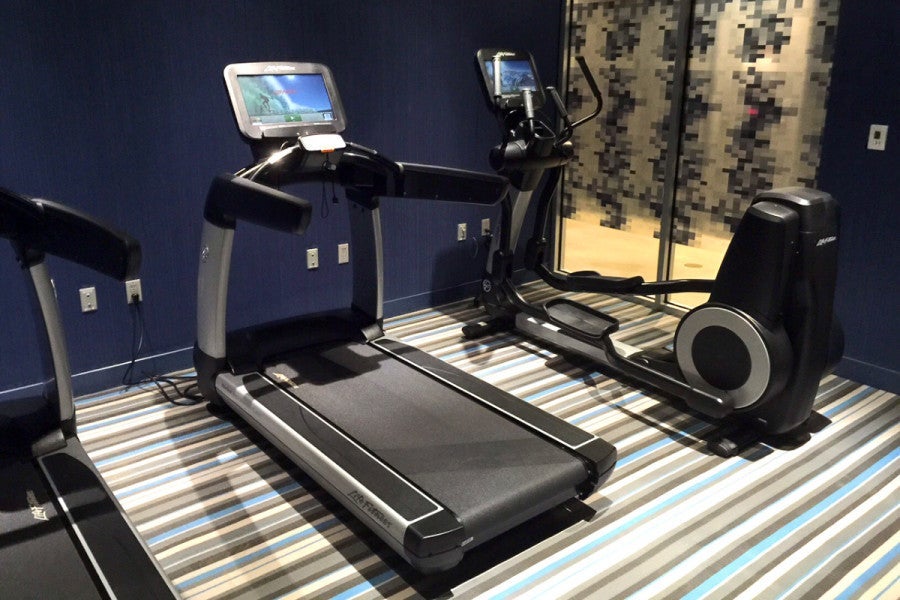 The gym is basic, with two treadmills and an elliptical machine.
