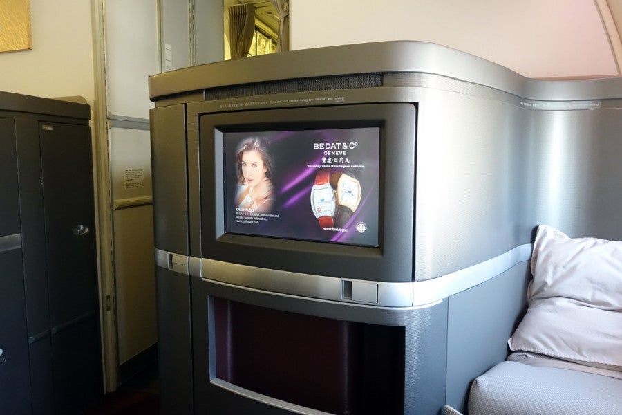 The TV rests flush with the seat for takeoff and landing.