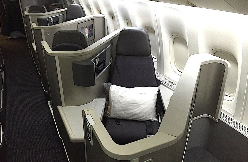 Notice that armrest on the aisle? It doesn't move, so rear-facing seats feel a bit narrower.
