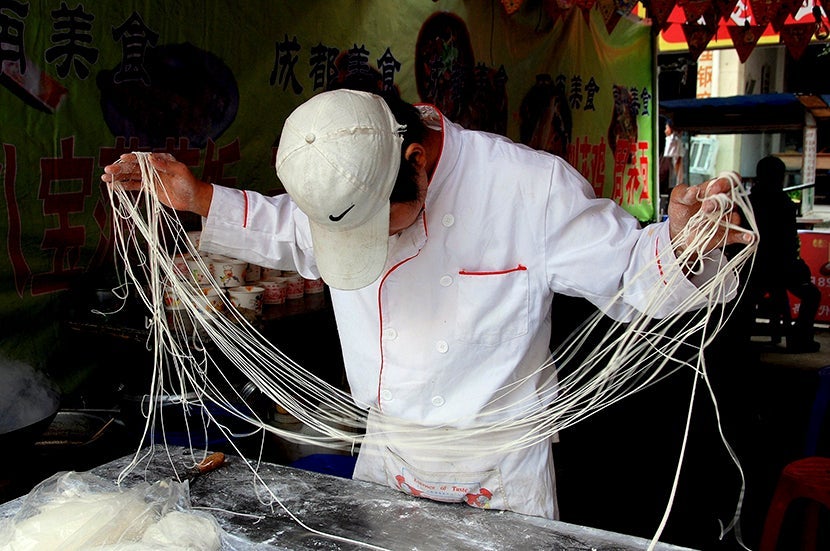 Hand-pulled noodles continue to be delicious, even after all these years. Photo courtesy of Shutterstock.
