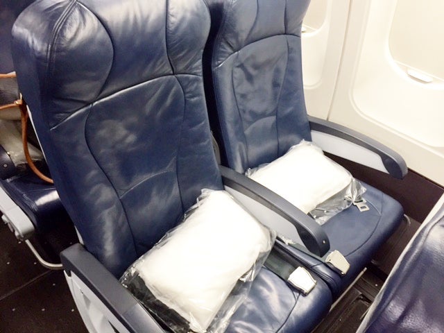 American Airlines economy, where at least you get a pillow. 