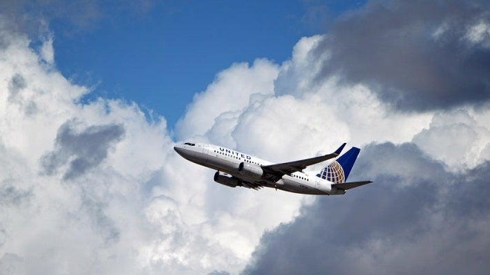 United-airplane-in-air-featured-shutterstock-131071832