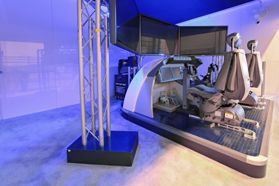 A large-scale flight simulator used to train pilots how to fly in real-time situations. Photo courtesy of Shutterstock. 