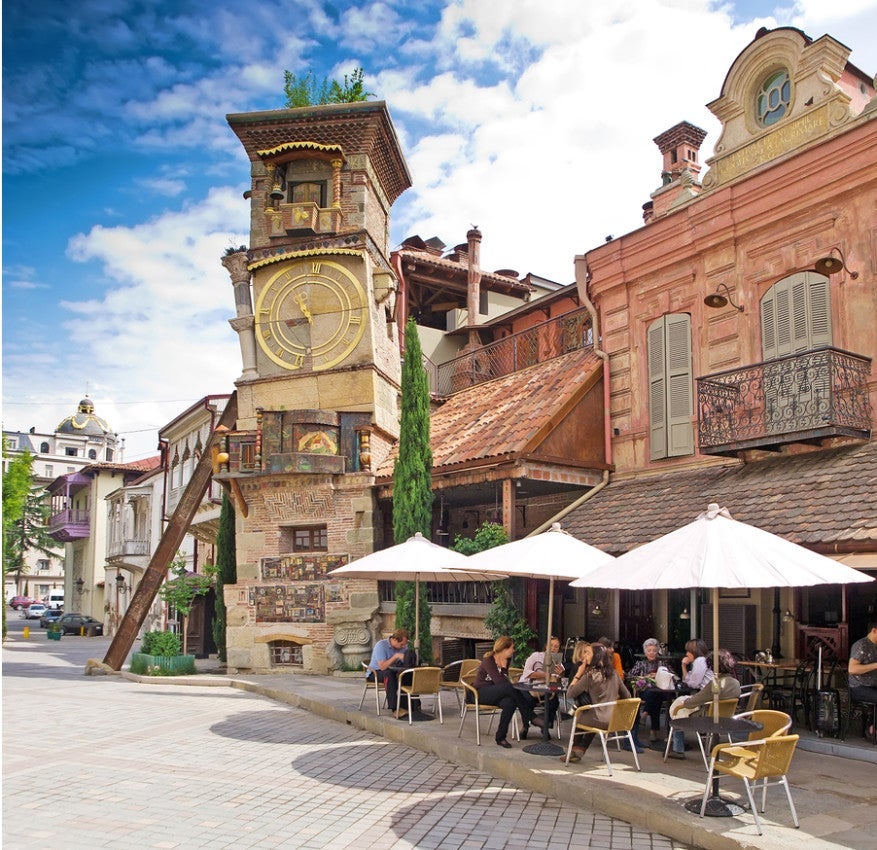 Café Gabriadze sits at the foot of Tbilisi's own "leaning tower" and is a great stepping off point into the old city. Photo courtesy of Shutterstock.