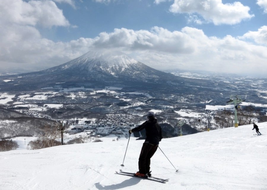 Visitors flock to Hokkaido's Niseko region to ski in the shadow of Mt. Yotei. Photo courtesy of Shutterstock.
