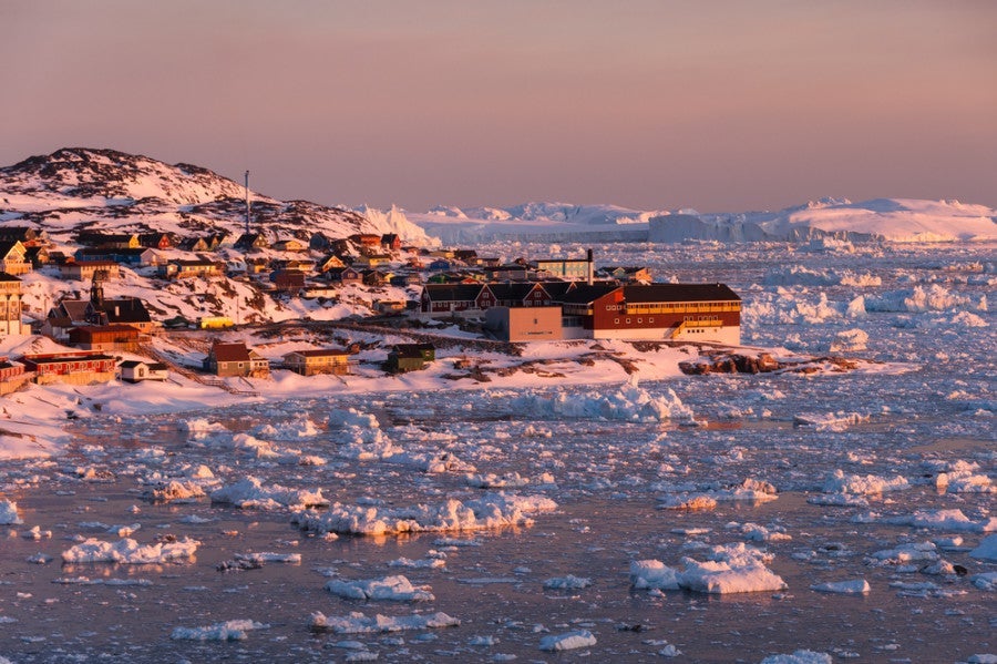 Come to Greenland in summer to experience the midnight sun in Ilulissat. Photo courtesy of Shutterstock.