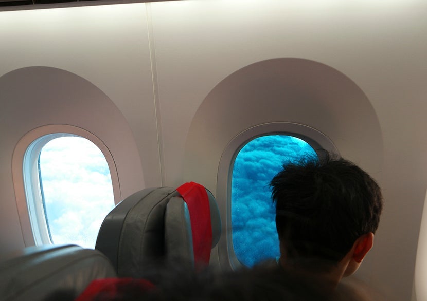 The window on the left is open. The one on the right is completely closed.