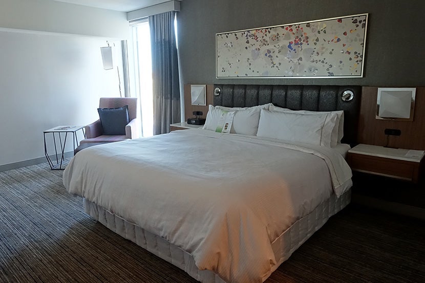 The design theme is vaguely musical — I think those are supposed to be guitar picks above the bed.