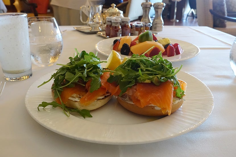 Bagels with smoked salmon, arugula and avocado.