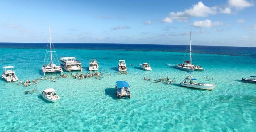 I was excited to swim at Stingray City, but couldn't wait to ask Thom Kisak about the future of SPG.