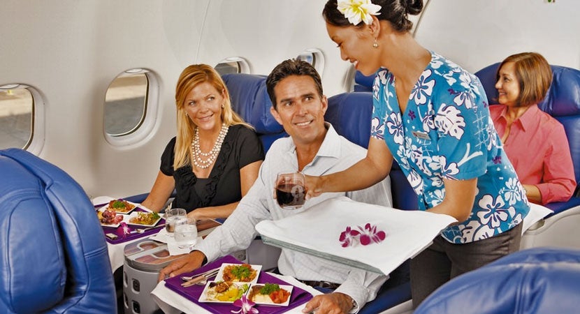 …but the old seats are as dated as this guy's hair. Image courtesy of Hawaiian Airlines.