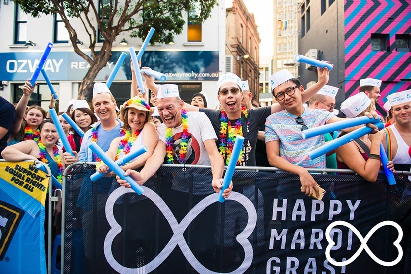 Revelers line the streets for the parade during Sydney Mardi Gras. Image courtesy of Sydney Gay & Lesbian Mardi Gras.