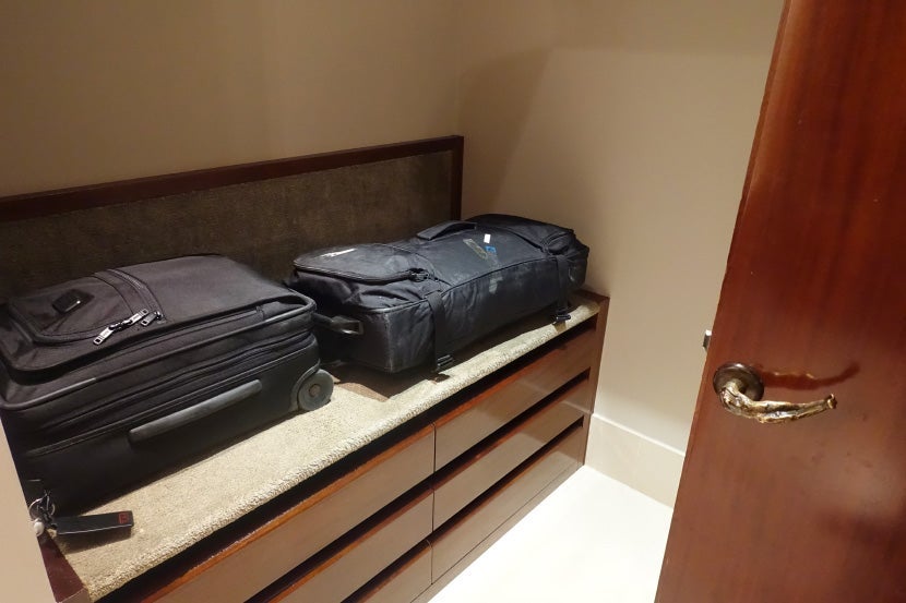 There was plenty of storage space for our checked bag and carry-on.