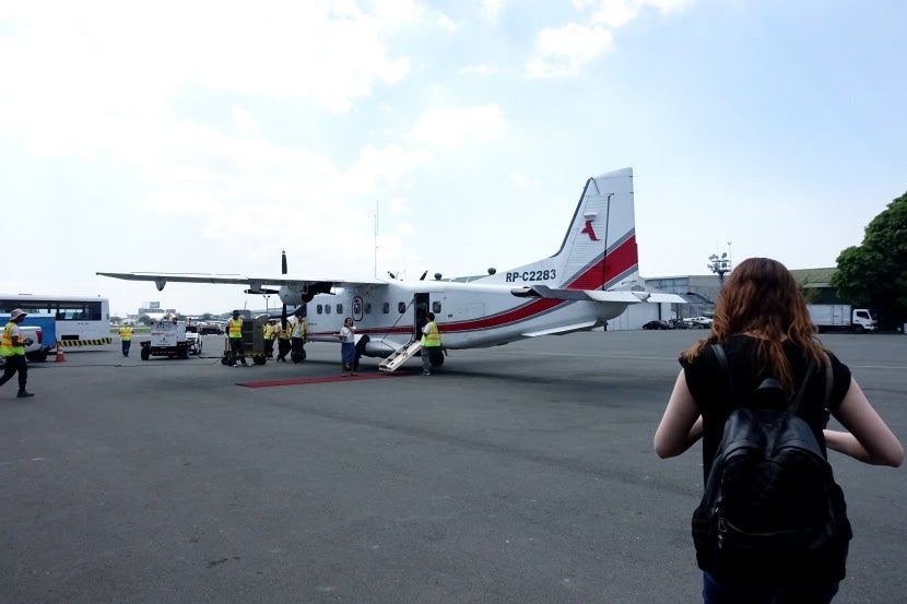 Heading to the plane en route to the Amanpulo.